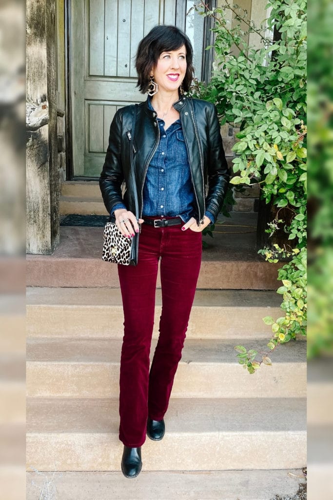 April from Stunning Style wearing red corduroy pants and a leather moto jacket inspired by a fall outfit.