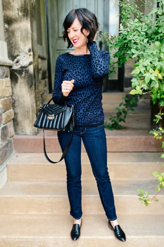 April from Stunning Style wearing a leopard top with jeans inspired by a fall outfit.