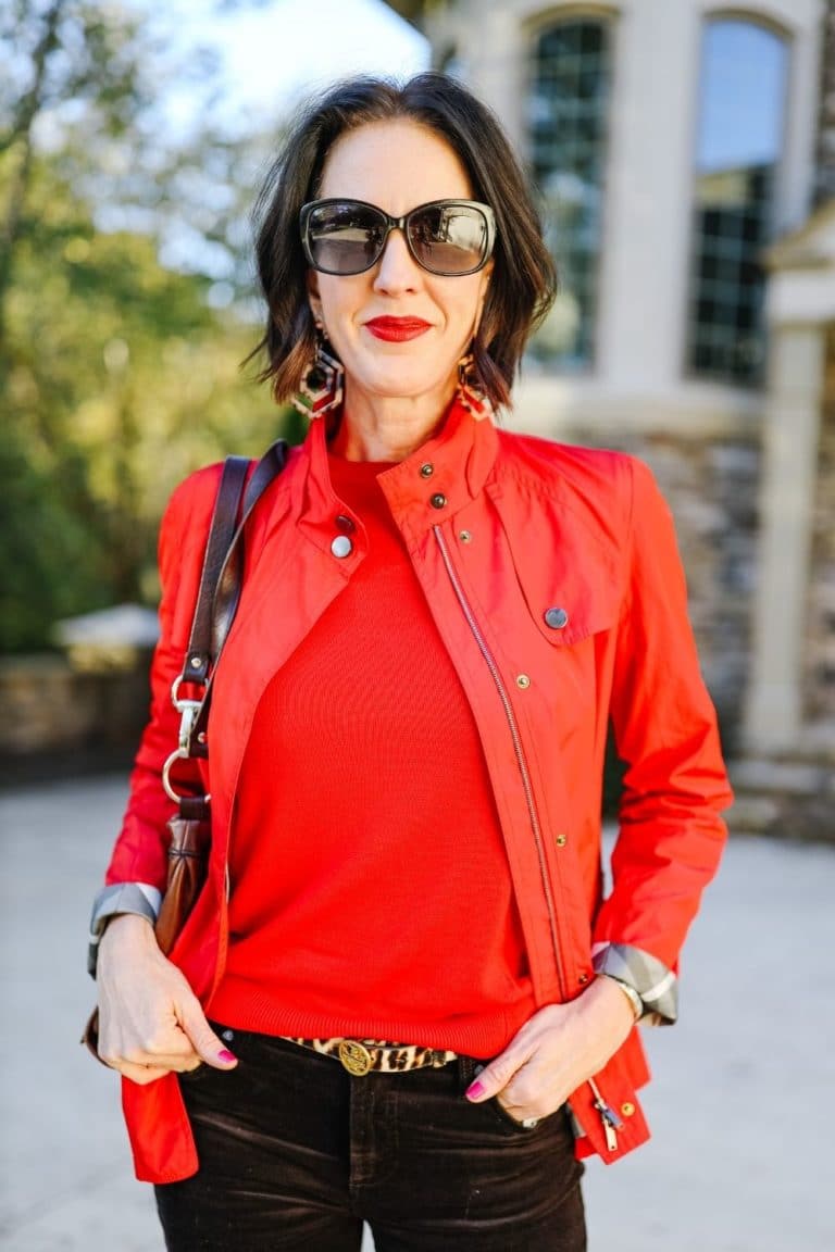 April from Stunning Style showing off her affordable wardrobe by wearing a stylish red jacket.