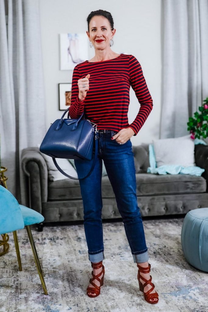 April from Stunning Style wearing fall wardrobe essentials, jeans and sandals.